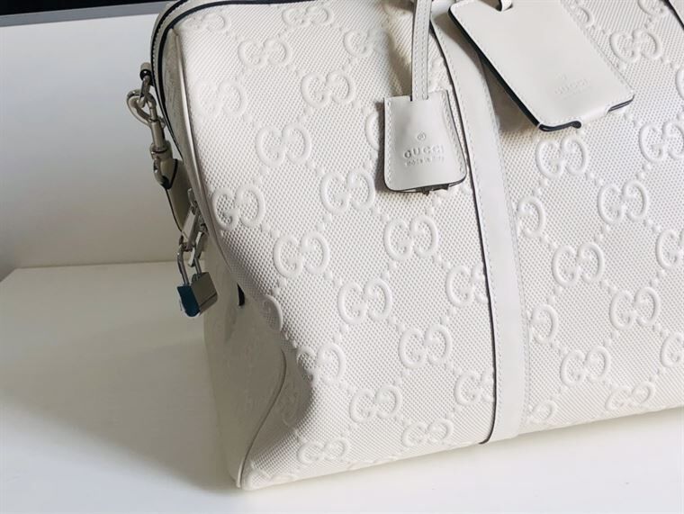 GUCCI GG EMBOSSED DUFFLE BAG - BG015