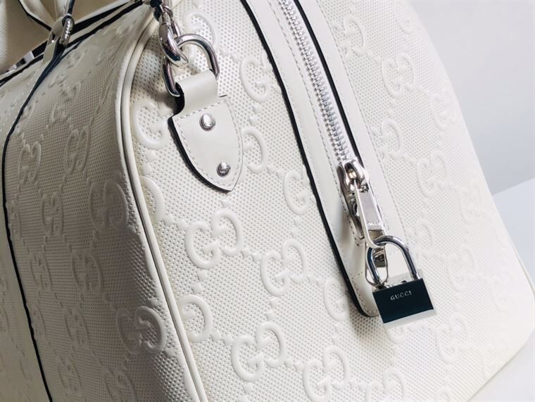 GUCCI GG EMBOSSED DUFFLE BAG - BG015