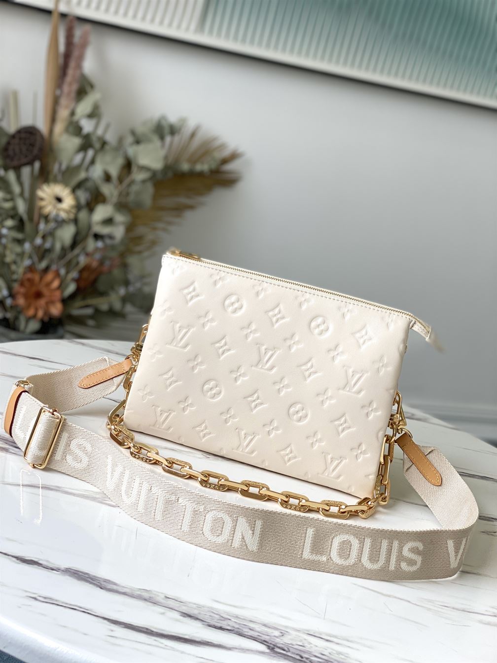 LOUIS VUITTON COUSSIN PM White