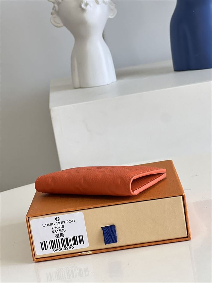 LOUIS VUITTON POCKET ORGANIZER RED MONOGRAM TAURILLON