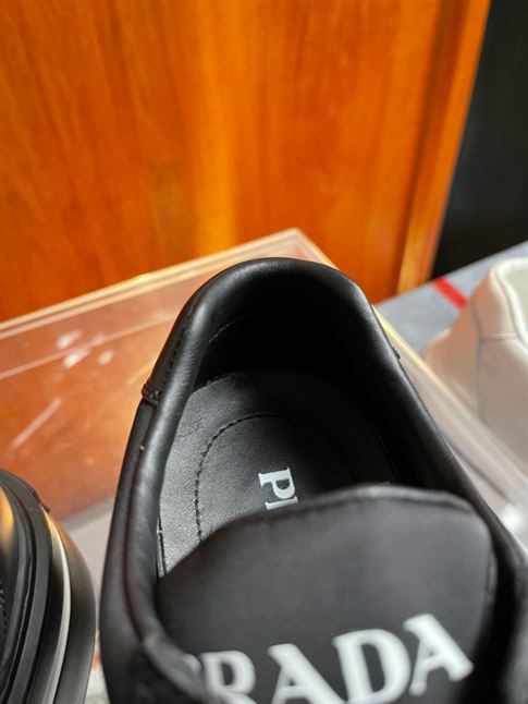 PRADA MACRO RE-NYLON AND BRUSHED LEATHER SNEAKERS - PRS055