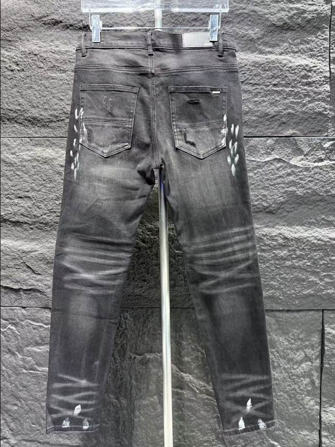 Amiri Ripp Black Patch-Detail Jeans - AMIJ021