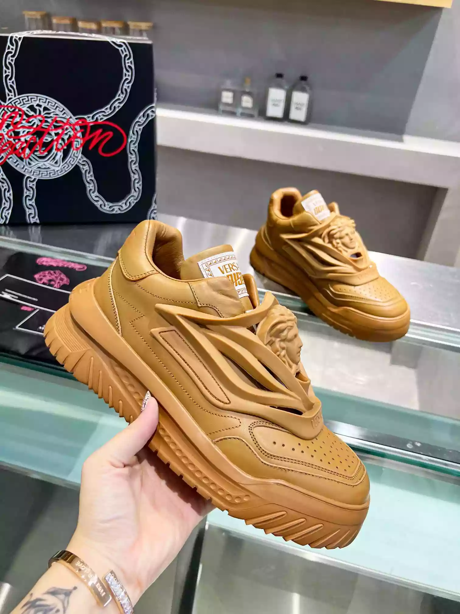 VERSACE WOMEN'S ODISSEA SNEAKERS IN BROWN LEATHER - VSS016