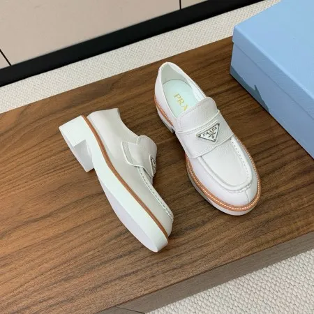 Prada Women's Loafers in White Grained Leather - PRL010 Prada Women's Loafers in White Grained Leather