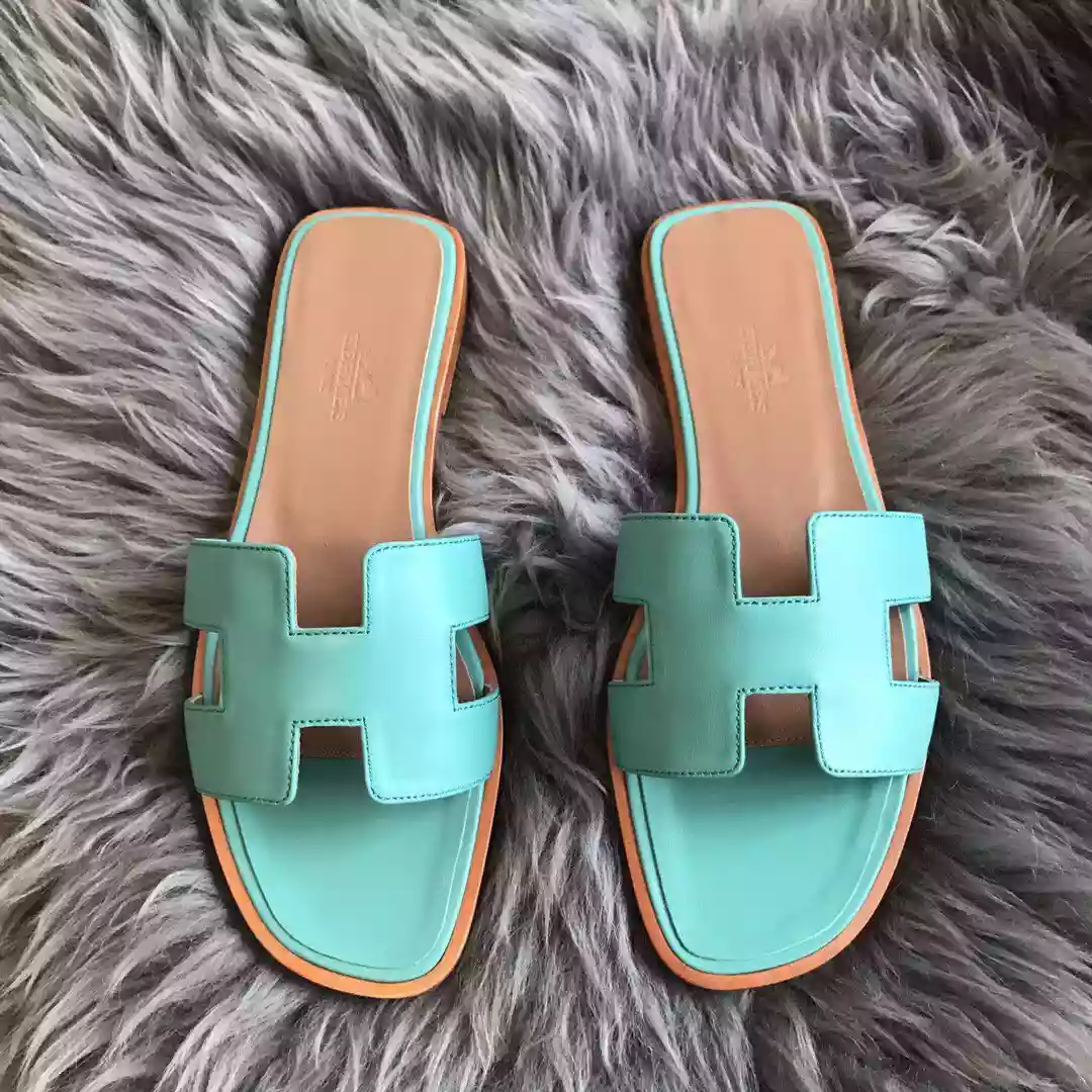 HERMES ORAN SLIDE SANDALS IN BLUE ATOLL SWIFT CALFSKIN - HMSD123