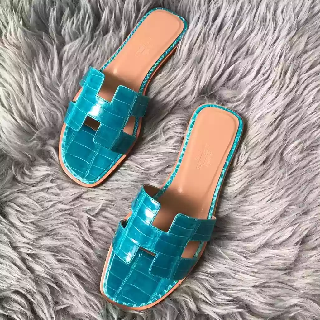 HERMES ORAN SLIDE SANDALS IN BLUE PAON SHINY NILOTICUS CROCODILE SKIN - HMSD061