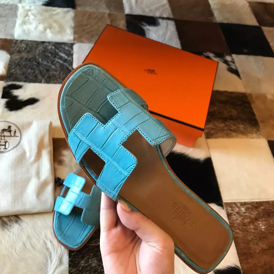 HERMES ORAN SLIDE SANDALS IN CELESTE SHINY NILOTICUS CROCODILE SKIN - HMSD048