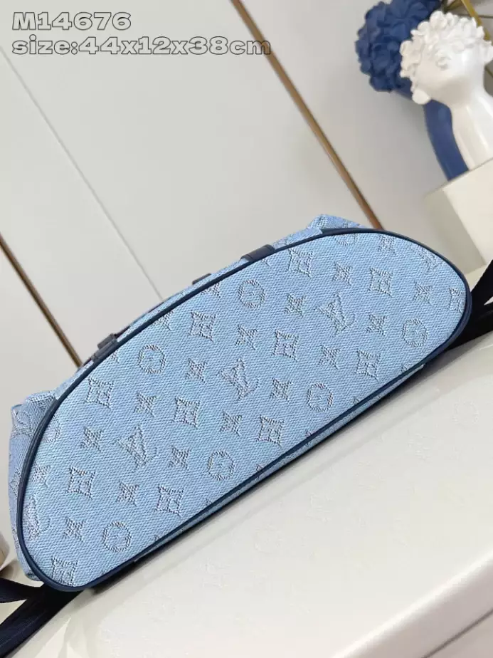CHRISTOPHER MM BACKPACK BLUE MONOGRAM HERITAGE CANVAS M14676 - LW335 DISCOVERY BACKPACK PM SKY BLUE MONOGRAM CANVAS