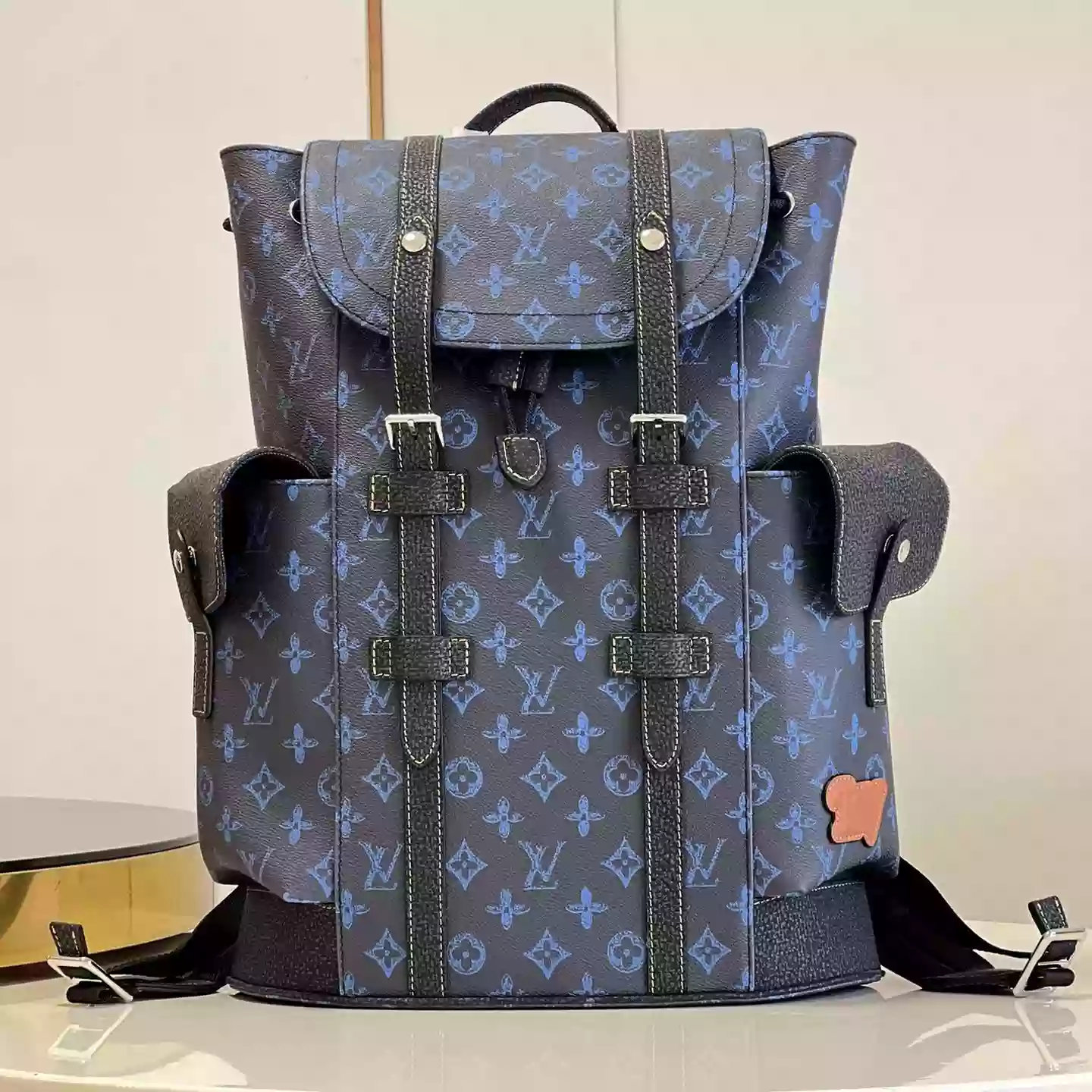 CHRISTOPHER MM MONOGRAM BACKPACK IN BLUE - LW345 DISCOVERY BACKPACK PM SKY BLUE MONOGRAM CANVAS
