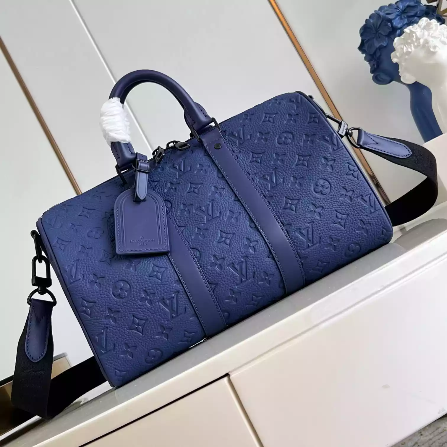 KEEPALL BANDOULIERE 35 BLUE MONOGRAM TAURILLON LEATHER M11691 - LW434 DISCOVERY BACKPACK PM SKY BLUE MONOGRAM CANVAS