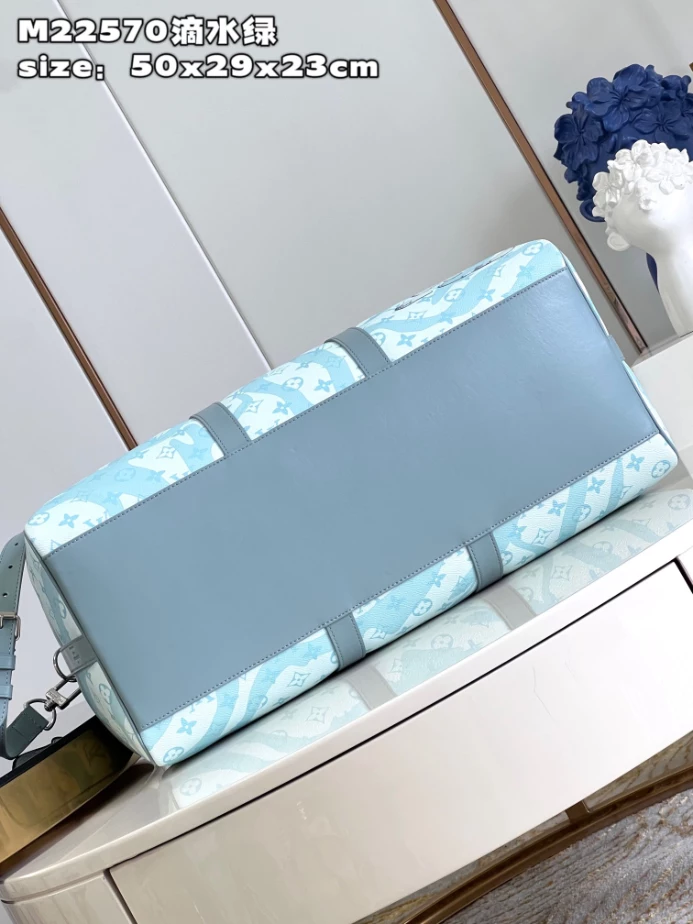 KEEPALL BANDOULIERE 50 BAG IN MONOGRAM AQUAGARDEN M22570 - LW374 DISCOVERY BACKPACK PM SKY BLUE MONOGRAM CANVAS