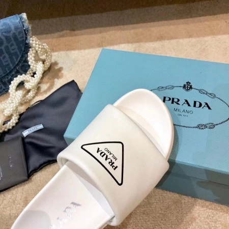 PRADA WHITE LEATHER SLIDES WITH PRINTED TRIANGLE LOGO - PSD089