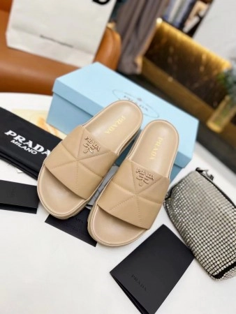PRADA WOMEN'S SLIDES IN BEIGE QUILTED NAPPA LEATHER - PSD082