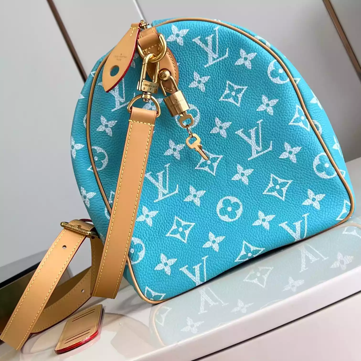 SPEEDY P9 BANDOULIERE 40 TURQUOISE M11564 - LW357 DISCOVERY BACKPACK PM SKY BLUE MONOGRAM CANVAS